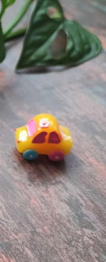 These beautiful Vroom... yellow with pink and blue wheel .. Set of 1 - Sajja Garden Nursery