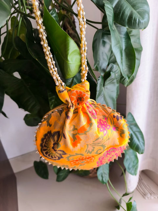 Designer Mango Yellow Brocade Potlis Gift Bags | Handcrafted Potli Bags | Buy Party favors party favors