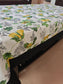 Tablecloth with floral and lemon design on a table