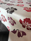 Close-up of fabric with floral pattern on a white background