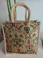 Decorative jute bag with floral pattern on a light background