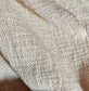 Close-up of beige fabric texture