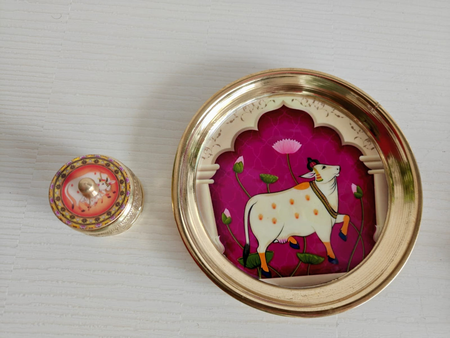 Buy Brass Pichwai Wine Cow  Kumkum Box with Plate ( 6 inches plate)