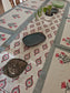 Sajja Handblock Table Linen Set Grey floral  , Set of 7  - One Table Runner, 6 Table Mats